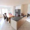 Appartement de 5.5 pièces au rez-de-chaussée avec jardin